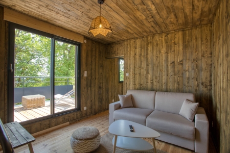 Image hebergement insolite LE PECH ETERNEL : CABANE SPA DES CHÊNES