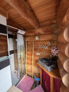 Image hebergement insolite CHALET EN RONDINS AVEC SPA ET CUISINE D'ETE