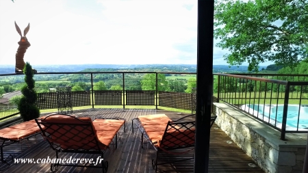 Image hebergement insolite CHALET-CABANE EN RONDINS AVEC SPA ET CUISINE D'ETE